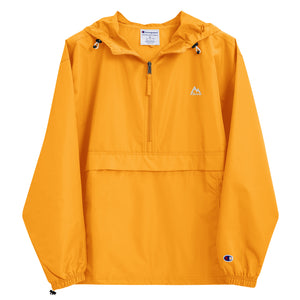 Gold Mountain Faith Co. packable windbreaker with minimal chest logo on a lightweight Champion jacket