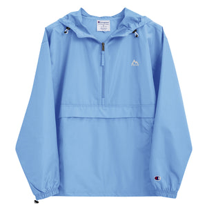 Light Blue Mountain Faith Co. packable windbreaker with minimal chest logo on a lightweight Champion jacket