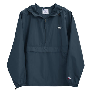 Navy Mountain Faith Co. packable windbreaker with minimal chest logo on a lightweight Champion jacket