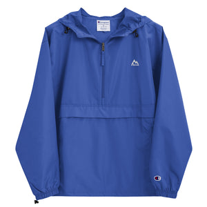 Blue  Mountain Faith Co. packable windbreaker with minimal chest logo on a lightweight Champion jacket