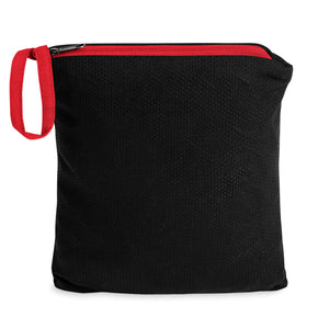 Red Packable windbreaker folded into compact pouch with zipper loop