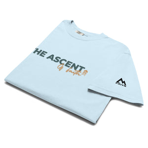 Light Blue Ascent of Faith T Shirt with minimalist upward movement design symbolizing the climb of faith by Mountain Faith Co.