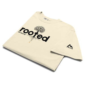 Ivory Rooted In Faith T Shirt featuring cross shaped root design representing deep spiritual foundations by Mountain Faith Co.
