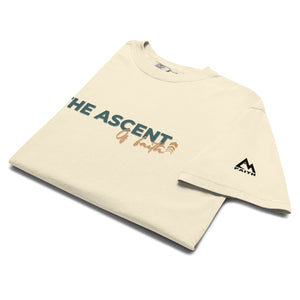 Folded Ivory Ascent of Faith T Shirt with minimalist upward movement design symbolizing the climb of faith by Mountain Faith Co.