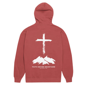 Red Faith Moves Mountains Hoodie with cross standing over rugged mountain peaks inspired by Matthew 17:20 by Mountain Faith Co.