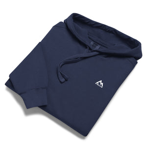 Folded navy Mountain Faith Co. hoodie with small chest logo.